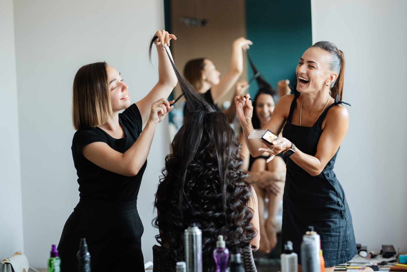 morning of the bride with the creation of the image of makeup and the creation of hairstyles